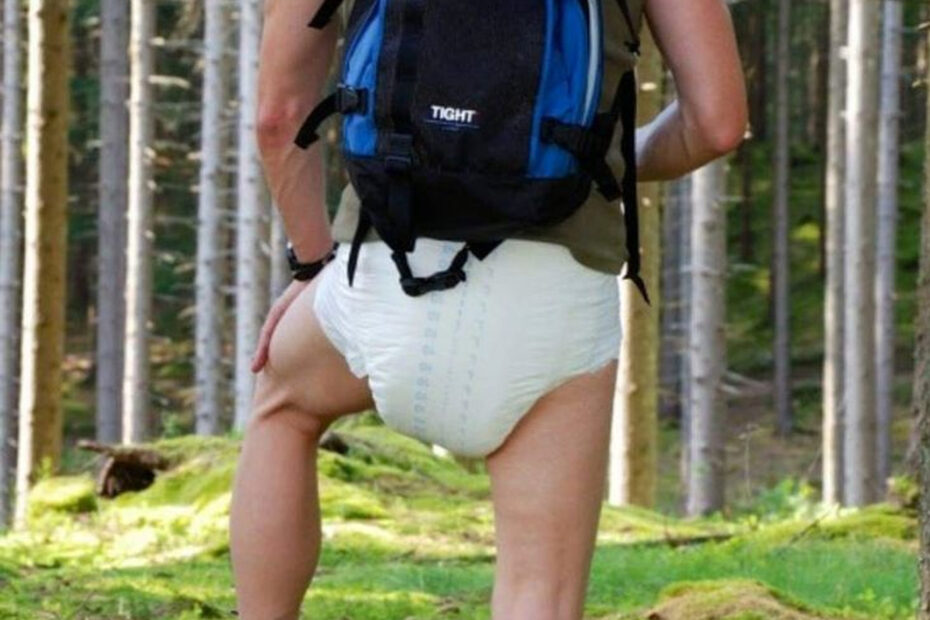 Man in a wet diaper outside